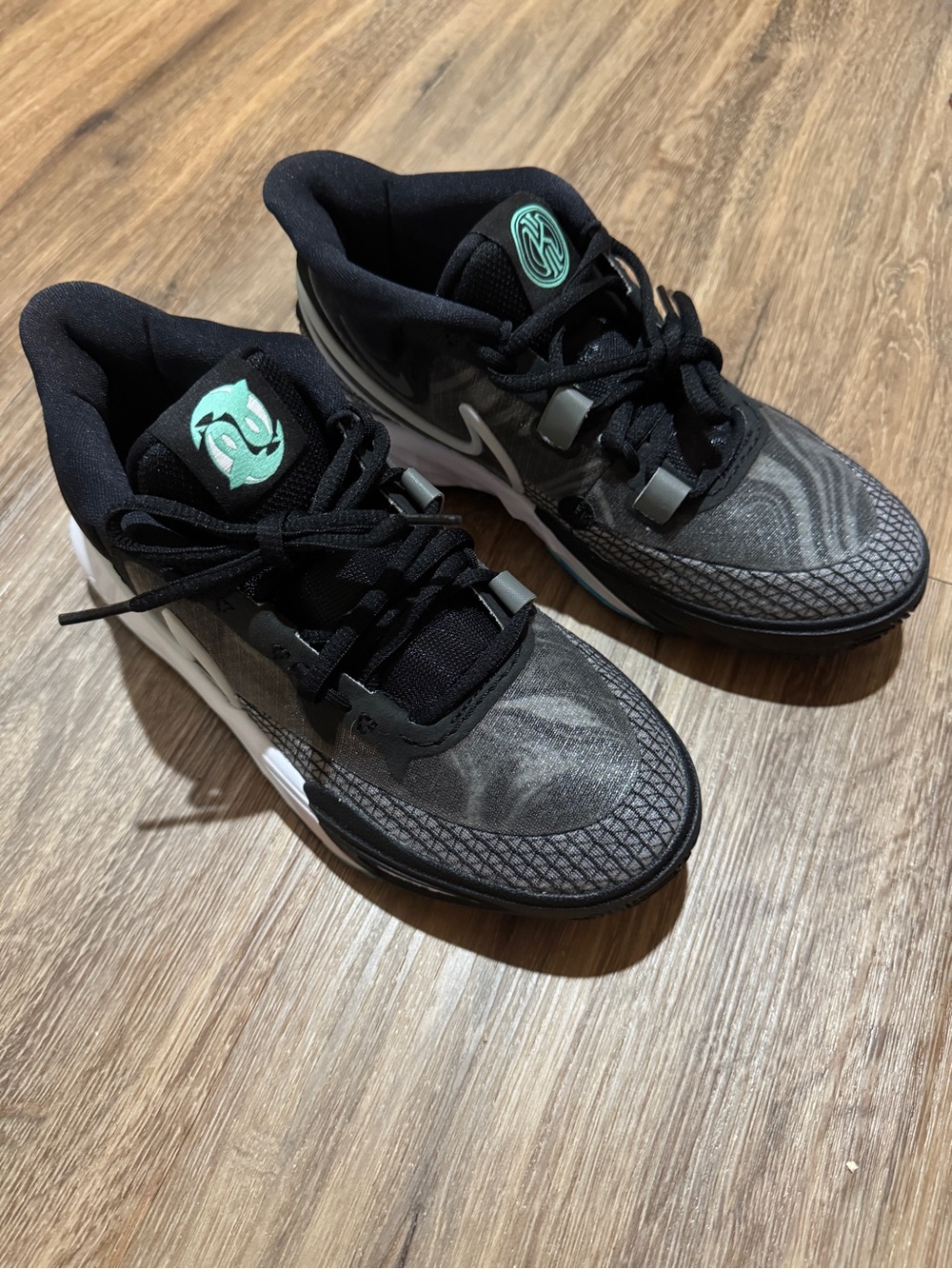 Nike Black Sneakers with Mint Accents